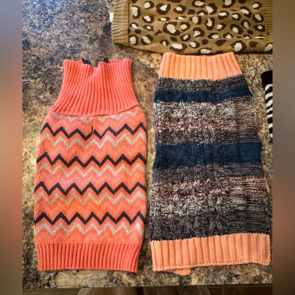 Multiple dog sweaters